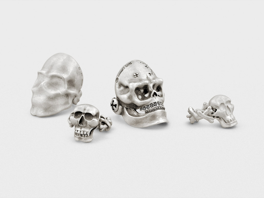 Handcrafted sterling silver skull rings by Snake Bones