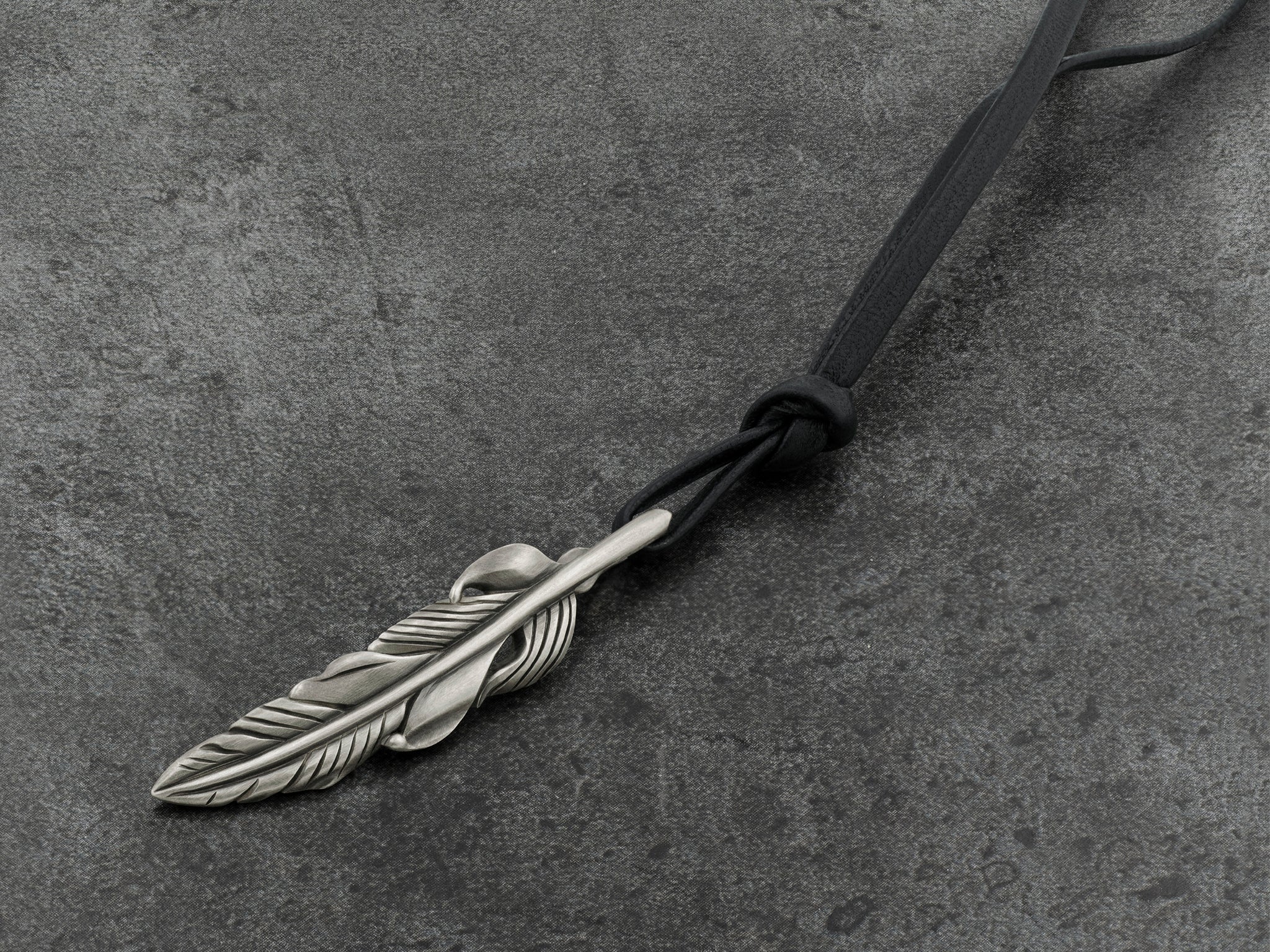 Baroque Feather Pendant in Sterling Silver – Snake Bones