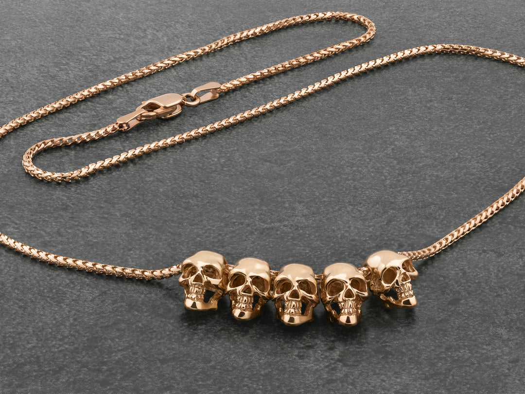 Five Skulls 18K Gold Trophy Necklace
