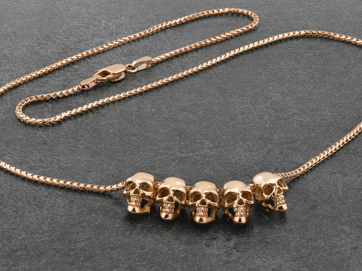 Five Skulls 18K Gold Trophy Necklace