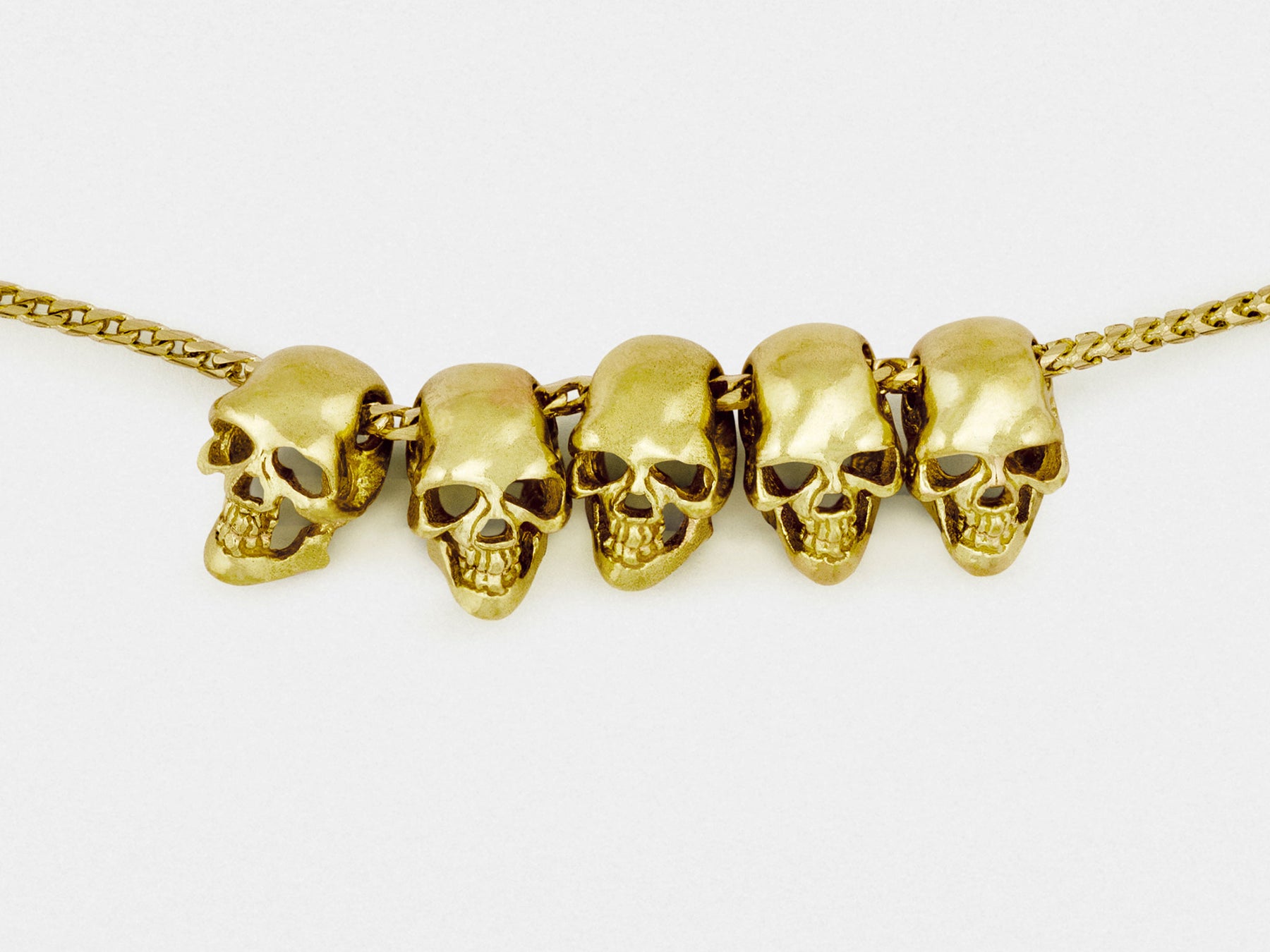 Solid gold shop skull pendant