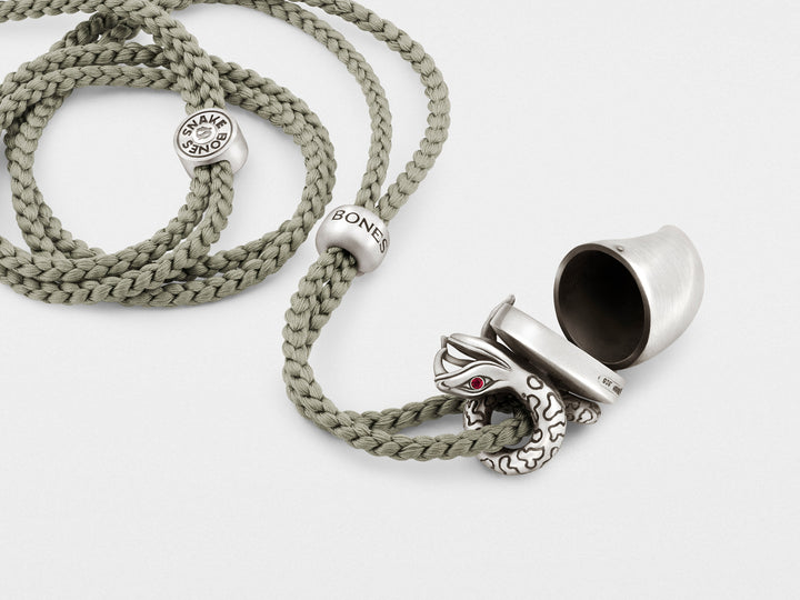 Snake Pendant Necklace with Tusk Locket and Ruby Eyes