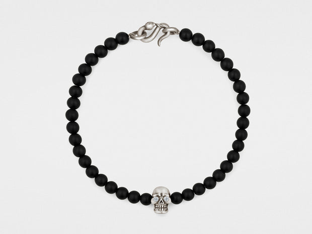 Skull Bracelet in Sterling Silver with Diamond Eyes, Black Onyx and Snake Clasp