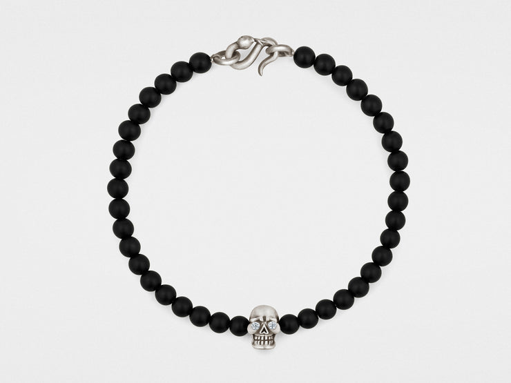 Skull Bracelet in Sterling Silver with Diamond Eyes, Black Onyx and Snake Clasp