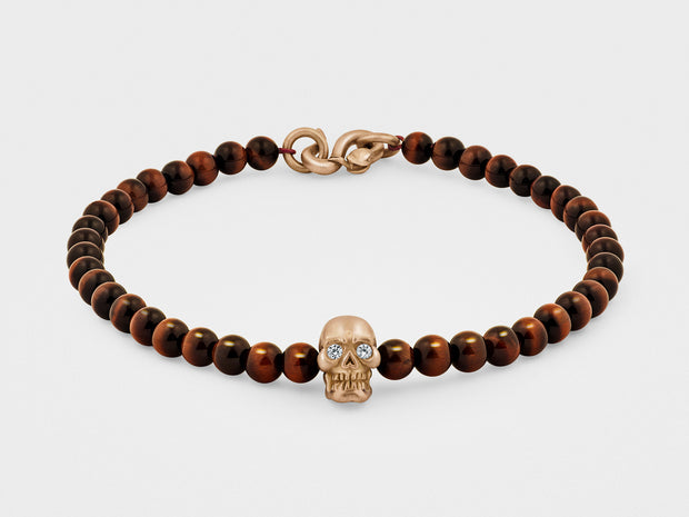 Skull Bracelet in 18K Gold with Diamond Eyes, Red Tiger Eye and Snake Clasp
