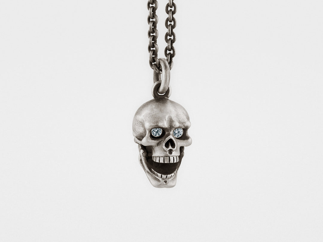 Skull Pendant with Hinged Jaw and Diamond Eyes in Sterling Silver