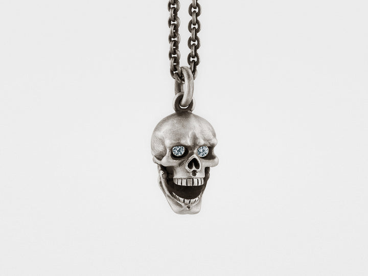 Skull Pendant with Hinged Jaw and Diamond Eyes in Sterling Silver