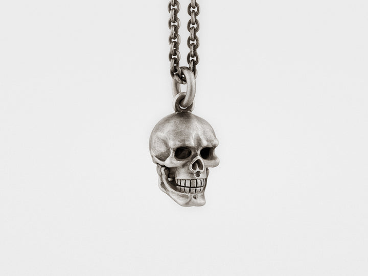 Skull Pendant with Hinged Jaw and Diamond Eyes in Sterling Silver