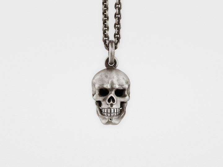 Skull Pendant with Hinged Jaw and Diamond Eyes in Sterling Silver