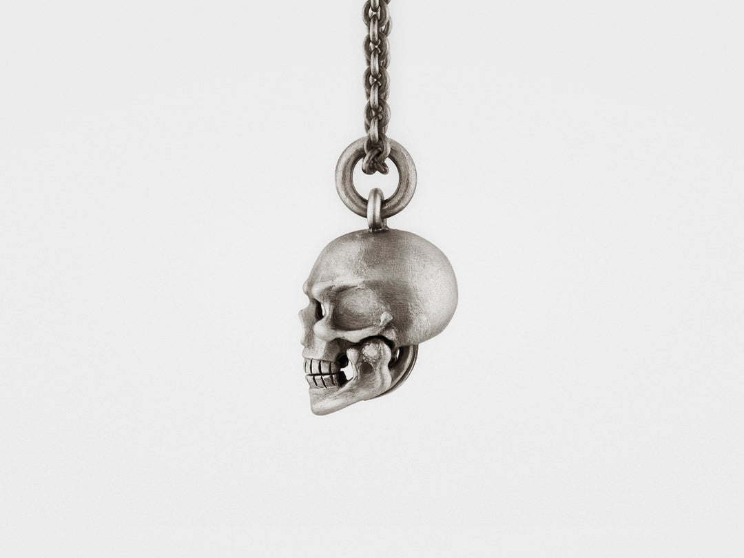 Skull Pendant with Hinged Jaw and Diamond Eyes in Sterling Silver