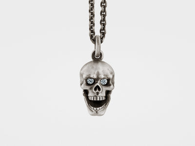 Skull Pendant with Hinged Jaw and Diamond Eyes in Sterling Silver