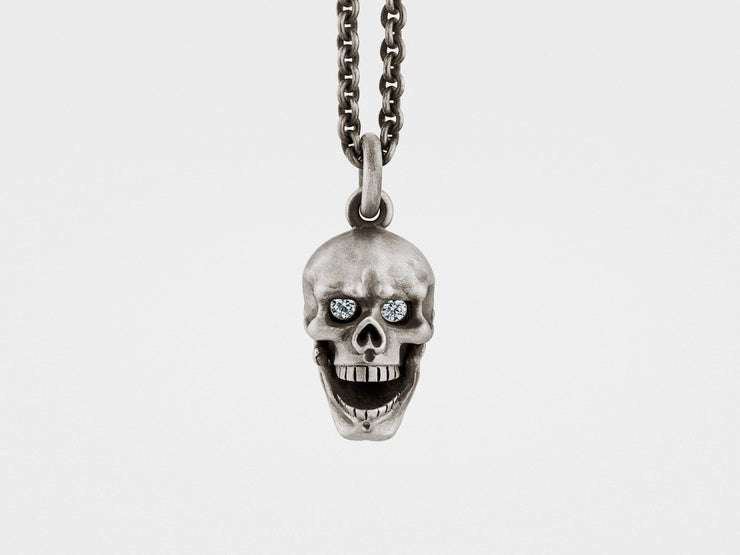 Skull Pendant with Hinged Jaw and Diamond Eyes in Sterling Silver