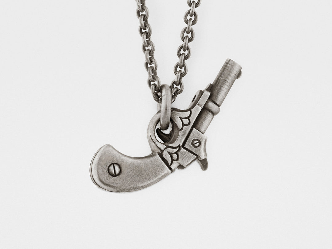Gun Pendant in Sterling Silver – Snake Bones