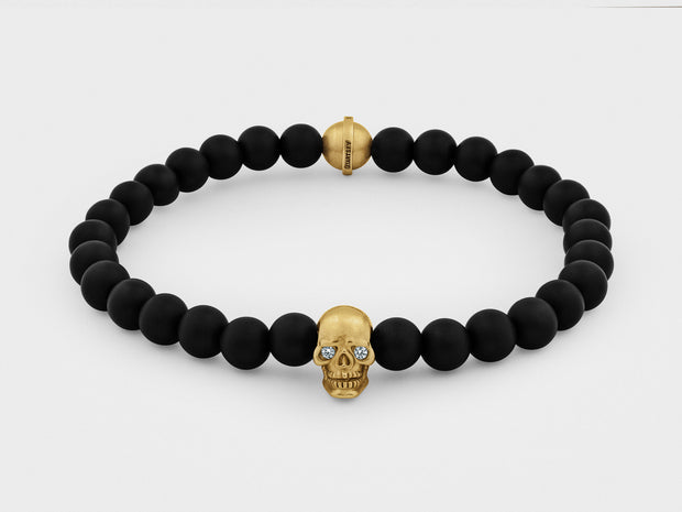 Skull Bracelet in 18K Gold with Diamond Eyes and Black Onyx