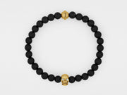 Skull Bracelet in 18K Gold with Diamond Eyes and Black Onyx