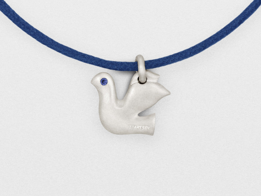 Dove Charm Bracelet in Sterling Silver with Blue Sapphires