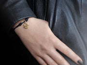 Snake Bones Logo Charm Bracelet in 18K Gold